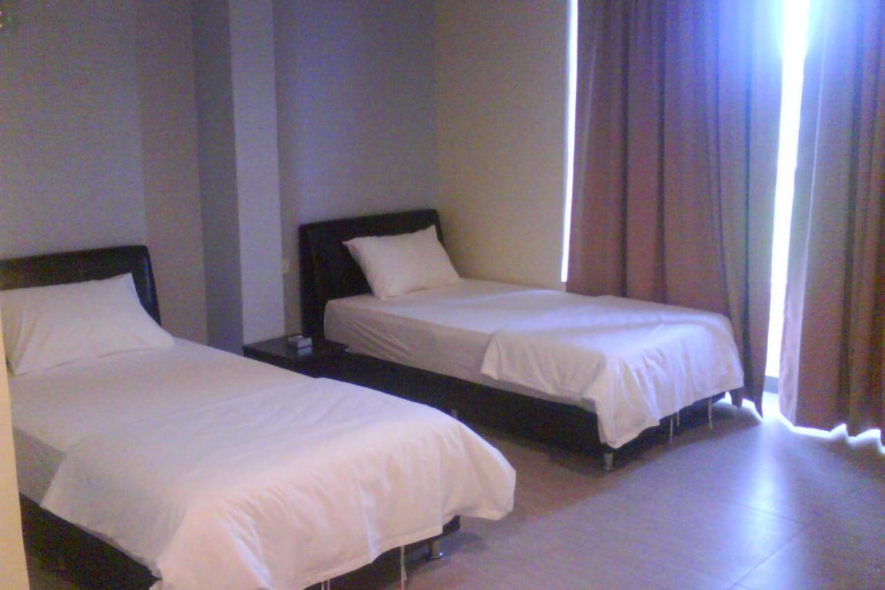 Oyo 90021 Star View Hotel Kampong Batu Tiga Rum bild